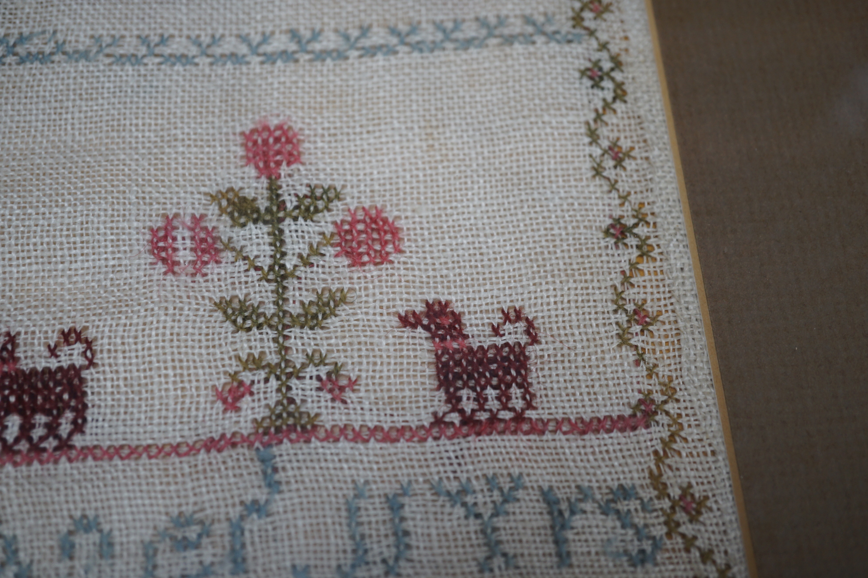 Two Victorian alphabet samplers worked by Emma and Hannah Barnes, one dated 1853, framed as one, overall 73 x 44cm
